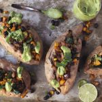 Spicy Southwest Loaded Sweet Potatoes with Cilantro Lime Avocado Cream