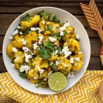 Roasted Curry Cauliflower with Feta and Cilantro